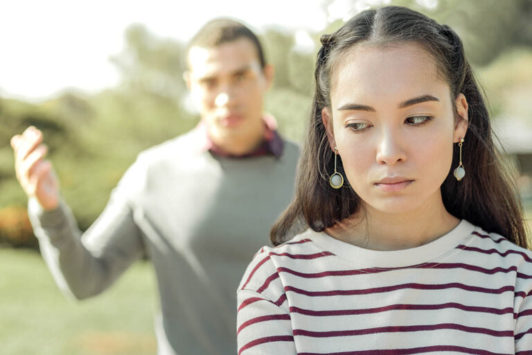 girl talking with guy wonders when does anger become a problem