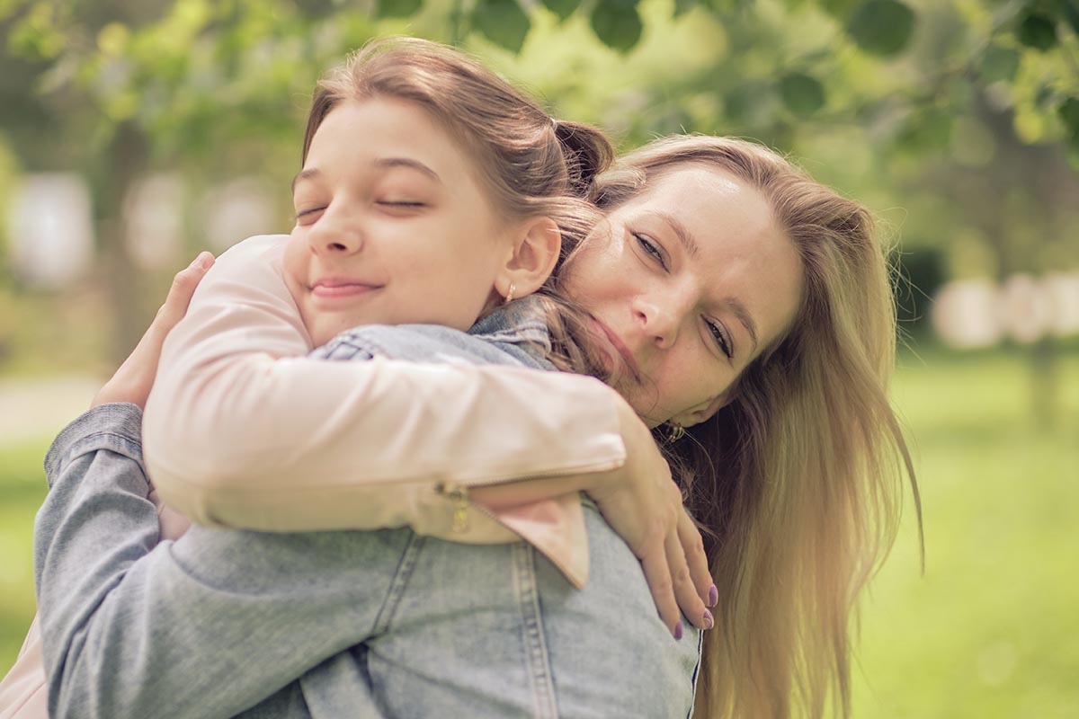 teen and parent hug when learning about what to do when you feel disillusioned in the future