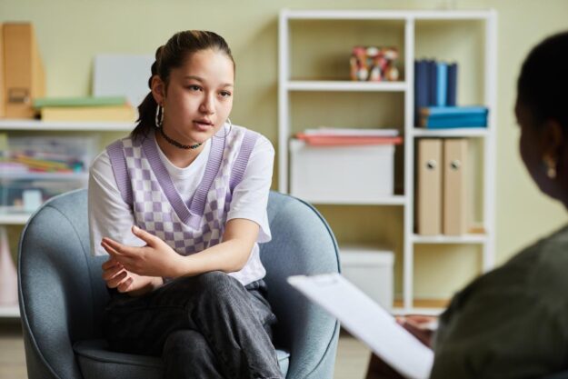 girl in therapy talks about how to support your child's mental health