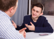 young man talks with loved one on national coming out day