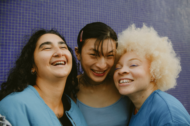 three teens exploring transgender terms and definitions