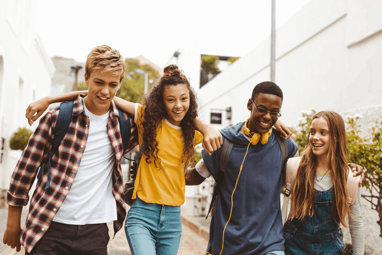 teens walking down the street and talking about gender-affirming care